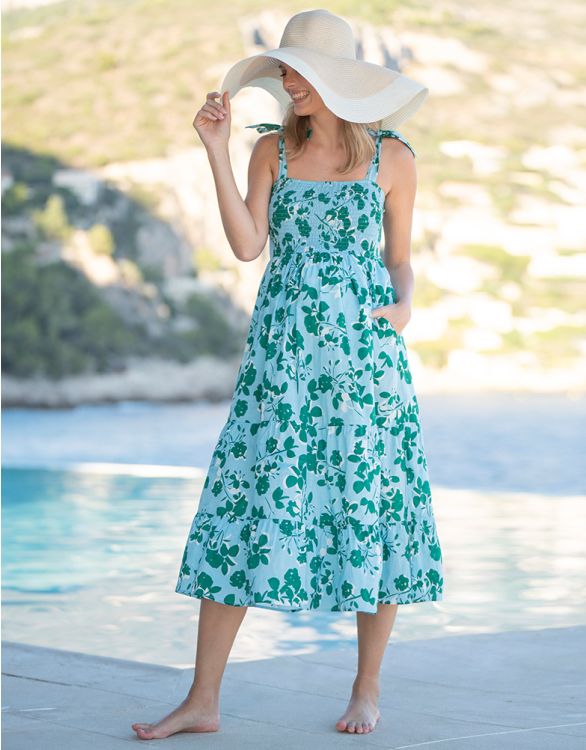 Imagen de Vestido premamá a media pierna con estampado floral en los hombros azul y verde
