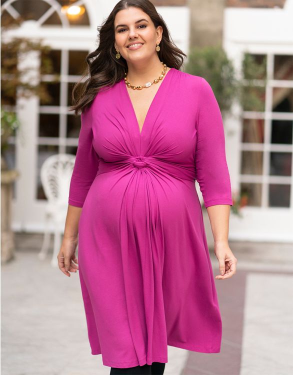 Imagen de Vestido premamá con nudo delantero en color rosa fucsia de la colección Curve