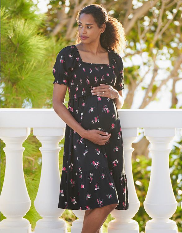 Imagen de Vestido fruncido de maternidad a lactancia con estampado floral negro